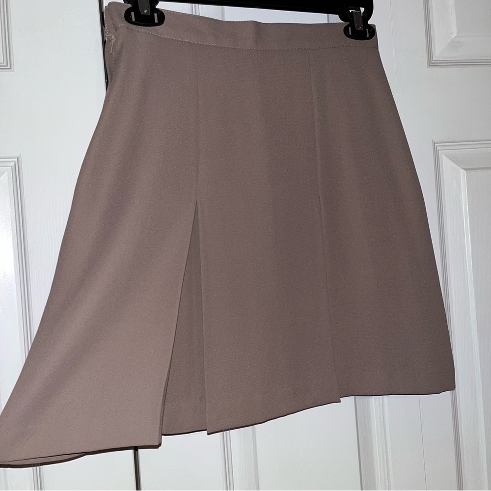 Camel skirt, high waist box pleat lined.
